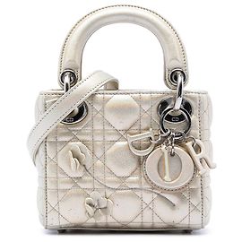 Lady Dior Lucky Dior Cannage in pelle di vitello micro metallizzata oro Dior