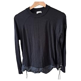 Moncler Oberteil aus schwarzer Wollstrickware und Nylon mit Kordelzug