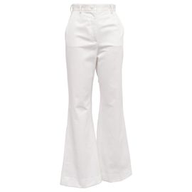 Pantalones acampanados de talle alto Dolce & Gabbana en algodón blanco