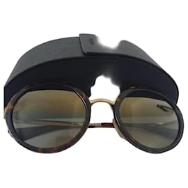 Gafas de sol Prada redondas de carey