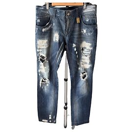 Jeans in denim blu con effetto vissuto Dolce & Gabbana