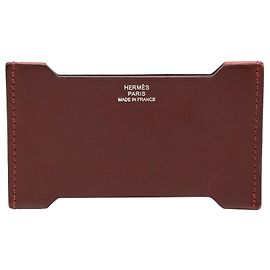 Portacarte Manhattan in Tadelakt rosso e Sombrero Hermès