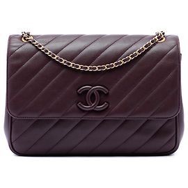 Chanel Red Diagonal Quilted Lambskin CC Signature Flap