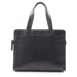 Borsa Tote Chanel in pelle di vitello martellata nera