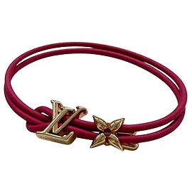 Bracciale charm Louis Vuitton Oro e Rosa