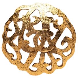 Spilla Chanel Gold CC in filigrana placcata oro