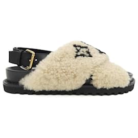 Sandali in shearling della linea Paseo Louis Vuitton