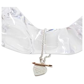 Bracciale con charm in argento sterling e oro giallo 18K di Tiffany & Co.