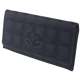 Cartera larga bipliegue negra Chanel de la línea New Travel