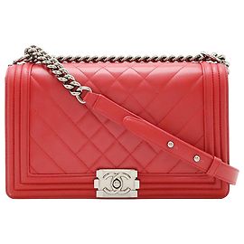 Chanel Boy Flap in agnello trapuntato Chevron e Diamante rosso Medium
