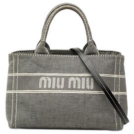 Miu Miu Bolso satchel pequeño de denim gris con logo