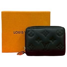 Cartera Louis Vuitton Portefeuille Lou Monogram Empreinte de piel