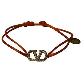 Autre Marque Bracciale Valentino Vlogo Signature in cotone arancione e strass
