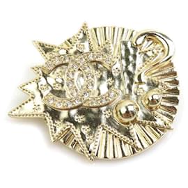 Spilla in metallo dorato Chanel
