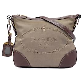 Borsa a tracolla Prada in tela beige Canapa con logo