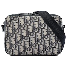 Pochette con zip in tela blu obliqua Dior con tracolla