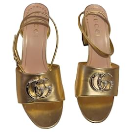 Gucci Goldene GG Crystal Sandaletten mit Absatz