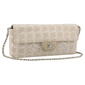 CHANEL Nuevo bolso de hombro Travel Line en lona beige con cadena plateada CC Auténtico ar14011SAV