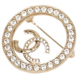 Spilla rotonda Chanel Gold CC placcata oro e strass