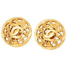 Orecchini Chanel Gold CC placcati oro Arabesque Clip On tondi