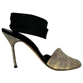 Manolo Blahnik Snake-Embossed Lace Up Sandals in Animal Print Leather