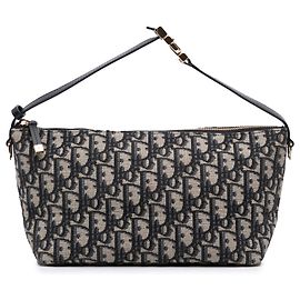Pochette Diortravel Nomad en lona Oblique azul de Dior, tamaño Medium