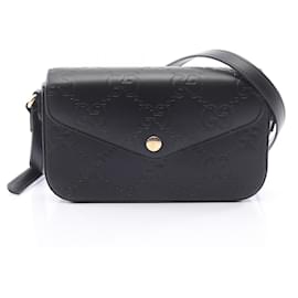 Borsa a tracolla Gucci GG Super Mini in pelle