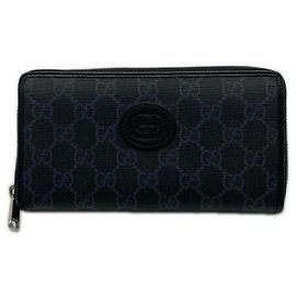 Cartera con cremallera GG Supreme Interlocking G de GUCCI