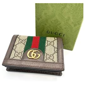 Cartera Bi-fold Gucci en GG Supreme