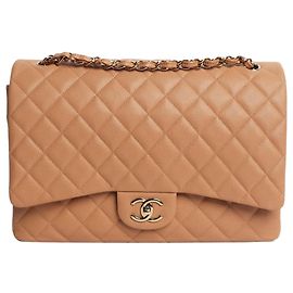 Chanel Borsa maxi Classic Double Flap trapuntata in caviar Blush