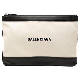 Clutch Balenciaga in tela marrone e blu navy con chiusura a clip M