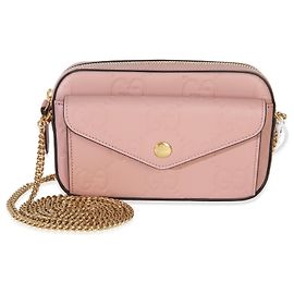 Mini portafoglio con catena Gucci in pelle di vitello rosa chiaro con logo GG impresso