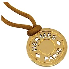 Hermès Collier Hermes Sellier plaqué or et cuir