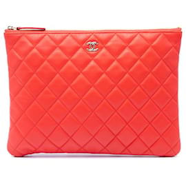 Clutch Chanel Orange Medium Quilted Lambskin O Case