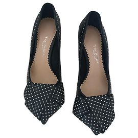 Autre Marque The Seller Décolleté in pelle nera con fiocco a pois
