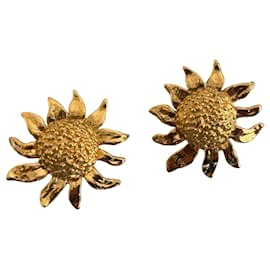 Boucles d'oreilles clip soleil Yves Saint Laurent en métal doré