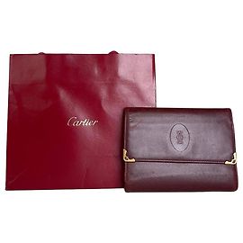Portafoglio in pelle vintage Cartier bordeaux con chiusura dorata