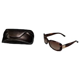 Occhiali da sole vintage Loewe in acetato tartarugato marrone oro