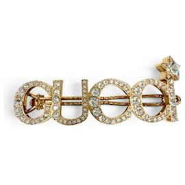 Clip per capelli Gucci con strass in oro e argento