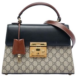 Bolsa tiracolo Gucci Beige Small GG Supreme com cadeado