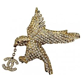 Spilla Chanel Vintage placcata in oro e strass