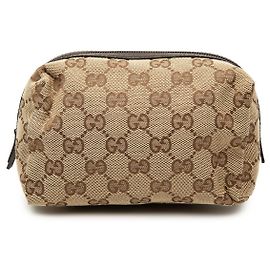 Pochette Gucci en lona GG beige