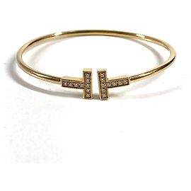 Pulseira de berloques em ouro 18K e diamantes Tiffany & Co.