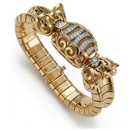 Gübelin Damenarmbanduhr 18k Gelbgold Secret Watch