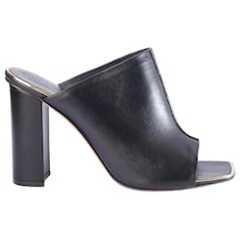 Céline Sandali piatti in pelle nera Celine con dettagli dorati
