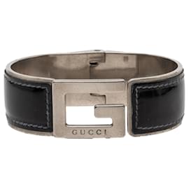 Bracciale G Cuff in pelle nera e ottone Gucci