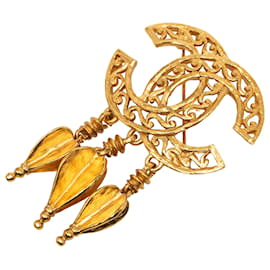 Spilla Chanel Gold CC con frange in filigrana dorata
