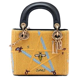 Lady Dior in tela ricamata spade giallo mini