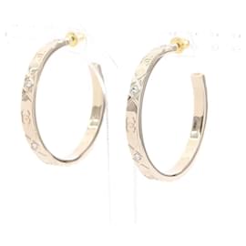 Pendientes de aro Chanel Coco Mark bañados en oro