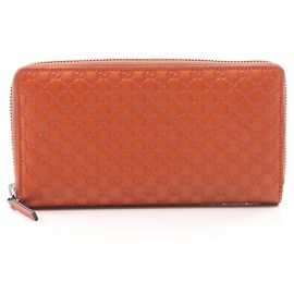 Cartera larga redonda Microguccissima Gucci